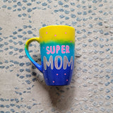 A Gradient colored mug (Yellow blue and ultramarine) with the words 