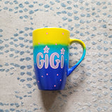 A Gradient colored mug (Yellow blue and ultramarine) with the name 