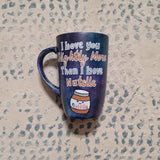 A black sky hand painted mug with the sentence 