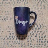 A dark sky hand painted mug with the name 