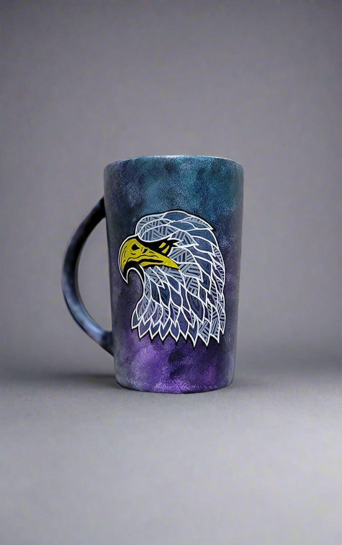 a black galaxy hand painted mug with an eagle design on it in zentangles of greys