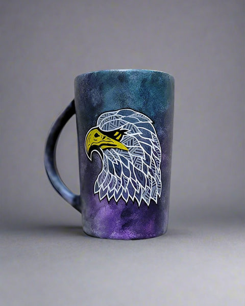 a black galaxy hand painted mug with an eagle design on it in zentangles of greys