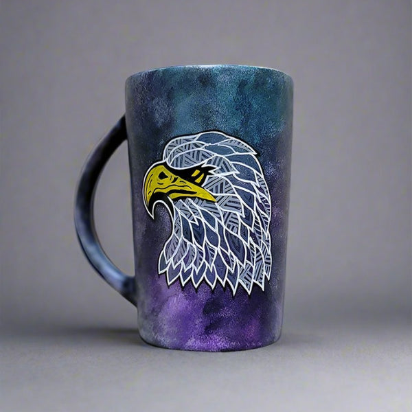 a black galaxy hand painted mug with an eagle design on it in zentangles of greys