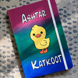 A gradient Hand painted Notebook (pink- green and blue) with the word 