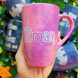 A Pink Galaxy hand painted mug with an the name 