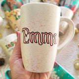 A Pearl white hand painted mug with the name 