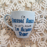 A baby blue hand painted mug with the words 