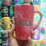 A red galaxy hand painted mug with the name 