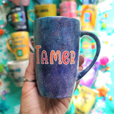 A Hand Painted Black Galaxy Mug with the name 