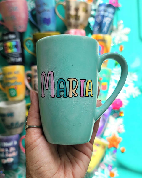 A Pastel green Hand-painted mug with the name "Maria"