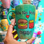 A hand-painted green galaxy mug with the words "we're the perfect combo"