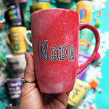 A hand-painted red galaxy mug with the name 