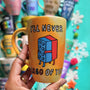 A yellow orange hand-painted mug with the words "I'll never" and below it two lego pieces hugging each other and the below it the words "LEGO of you"