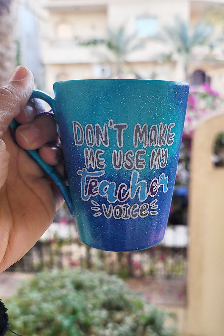  Blue Galaxy hand painted mug with the words "Don't make me use my teacher voice"