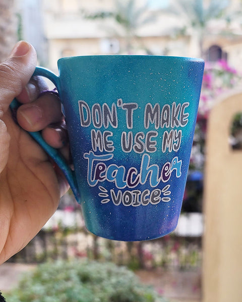  Blue Galaxy hand painted mug with the words "Don't make me use my teacher voice"