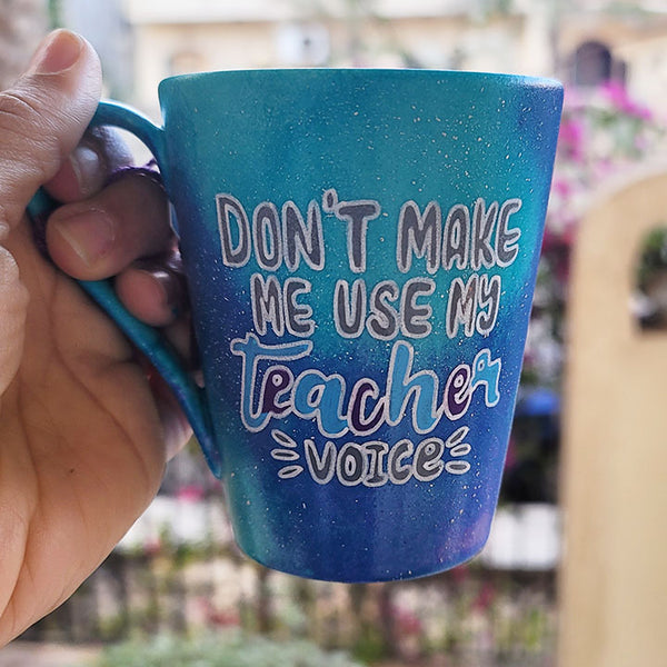  Blue Galaxy hand painted mug with the words "Don't make me use my teacher voice"