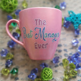 A Shimmery pink hand painted mug with the words 