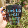 A Dark sky mug with the words "Leave life better than you found it "