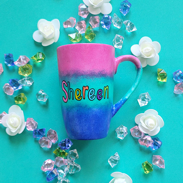 A Gradient hand painted mug (Pink Green and ultramarine) with the Name "Shereen"