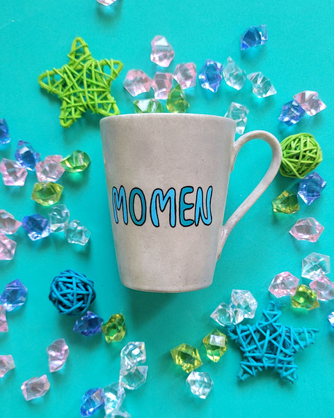 A Taupe hand painted mug with the name "Momen"