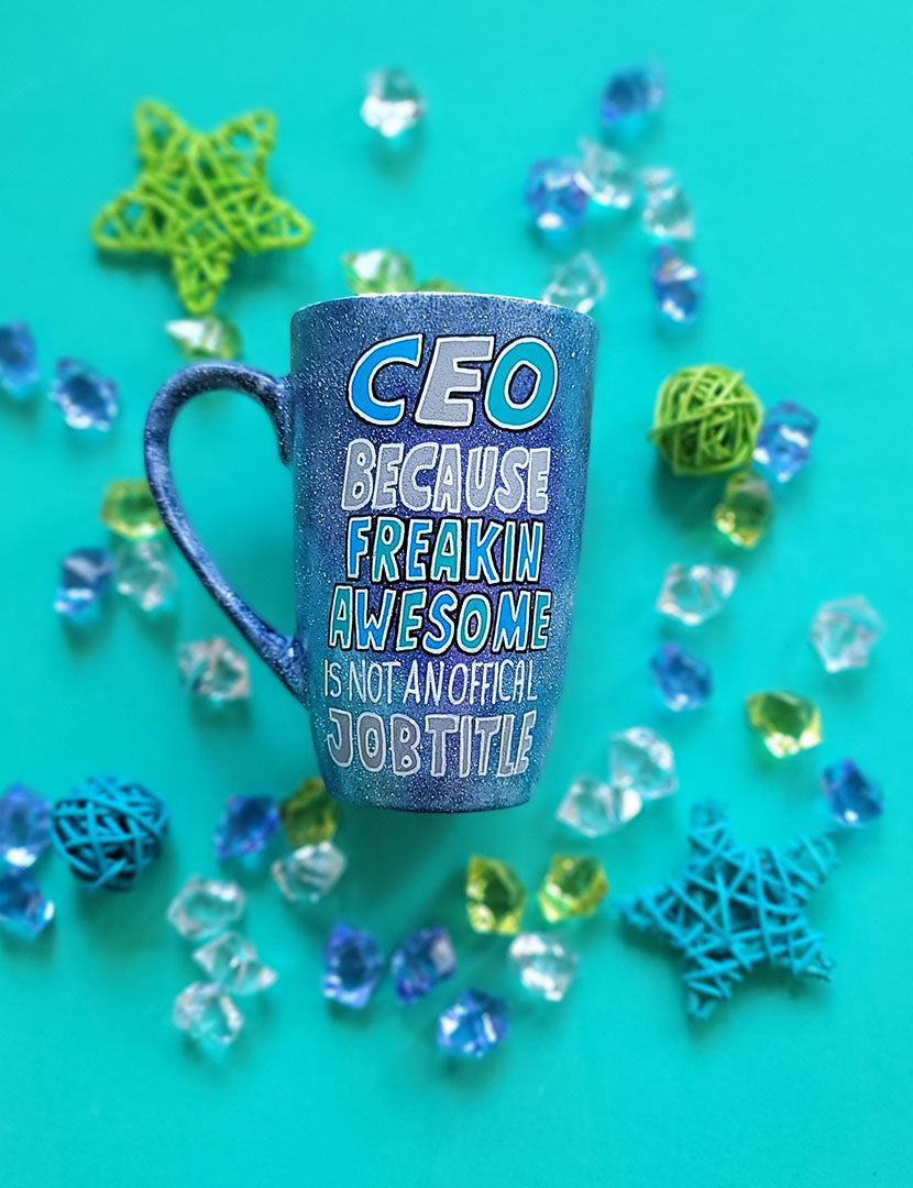 A bluish galaxy hand painted mug with the words "CEO because Freakin Awesome is not an official job title"