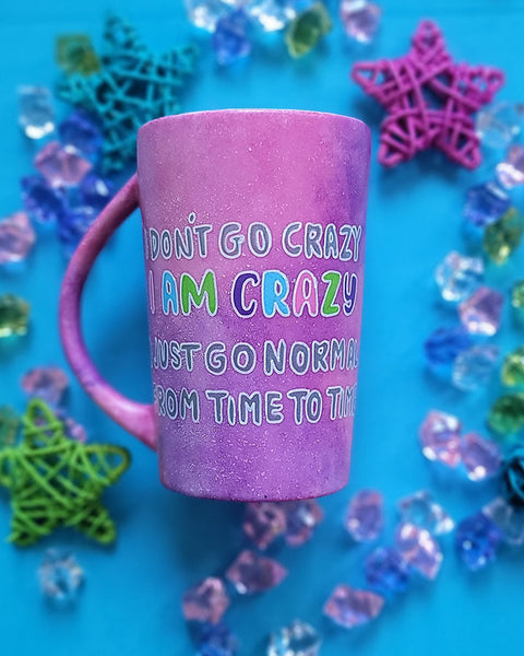 A Pink galaxy Hand Painted mug with the words "I Don't go Crazy, I Am Crazy, I just go normal from time to time"