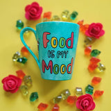 A green Galaxy hand painted mug with the words 