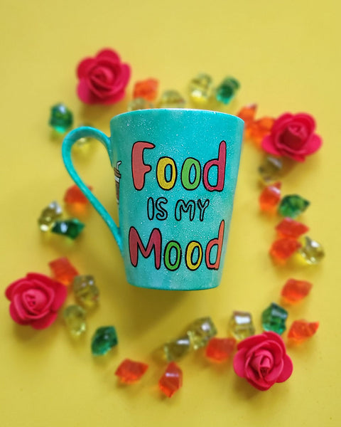 A green Galaxy hand painted mug with the words "food is my mood" and fast food items scattered all over