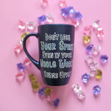 A Shimmery blue hand painted mug with the words 