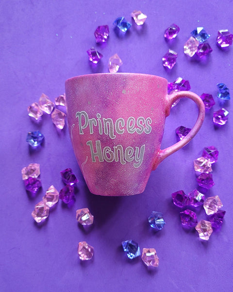 A Pink galaxy Hand painted mug with the words "Princess Honey"