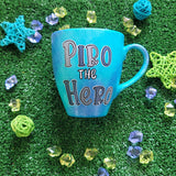 A Blue hand painted mug with the words 