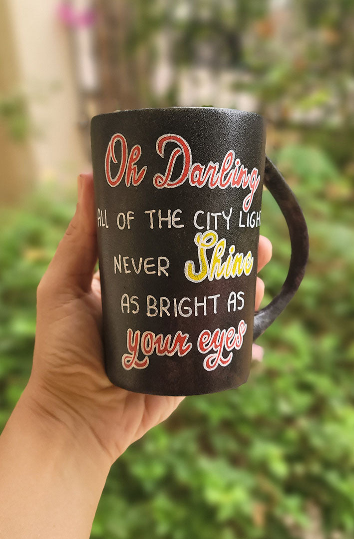 A Dark mug with the sentence