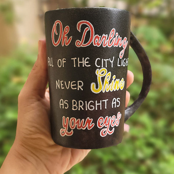 A Dark mug with the sentence