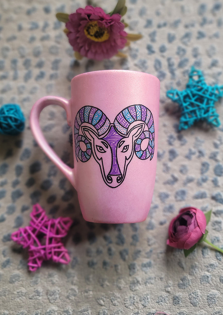 A Hand-painted Shimmery Pink mug with the Aries sign