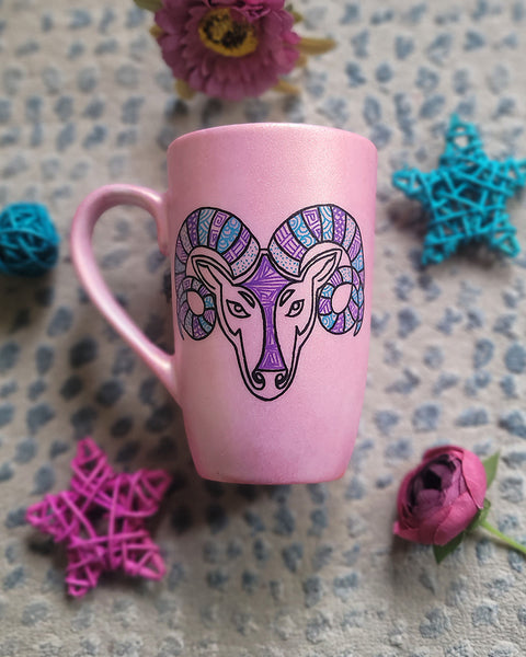 A Hand-painted Shimmery Pink mug with the Aries sign