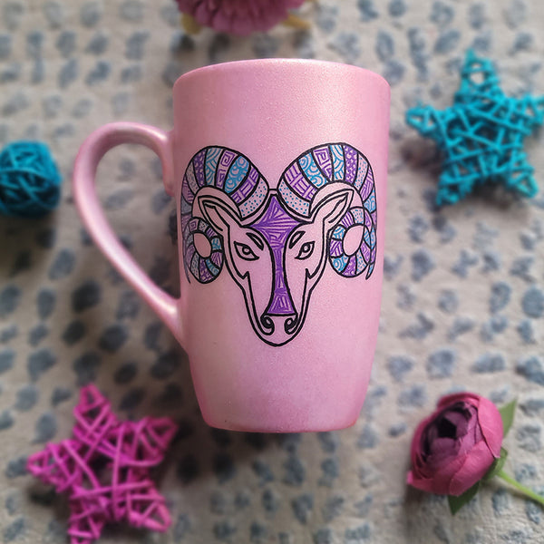 A Hand-painted Shimmery Pink mug with the Aries sign