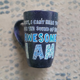 A Black Galaxy hand painted mug with the sentence 