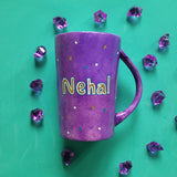 A Purple Hand painted mug with the name 