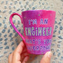 A Pink galaxy hand painted mug with the sentence "I'm and Engineer what your superpower"