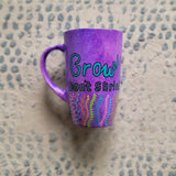 A Purple hand painted mug with the words 