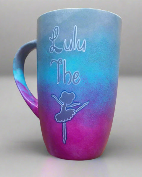 A Gradient hand painted mug (blue-grey-pink) with the words Lulu the and then a silhouette of a ballerina 