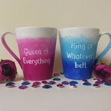 2 hand-painted mugs. One with gradients of pink and has the words 