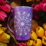 A Purple Galaxy Hand Painted Mug with a mandala