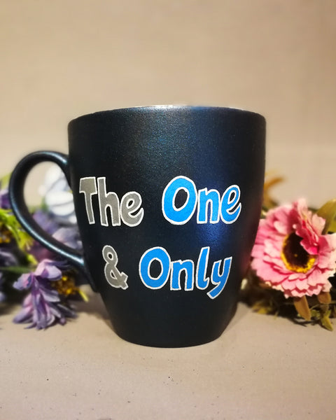 A Shimmery blue hand painted mug with the words "the one and only"