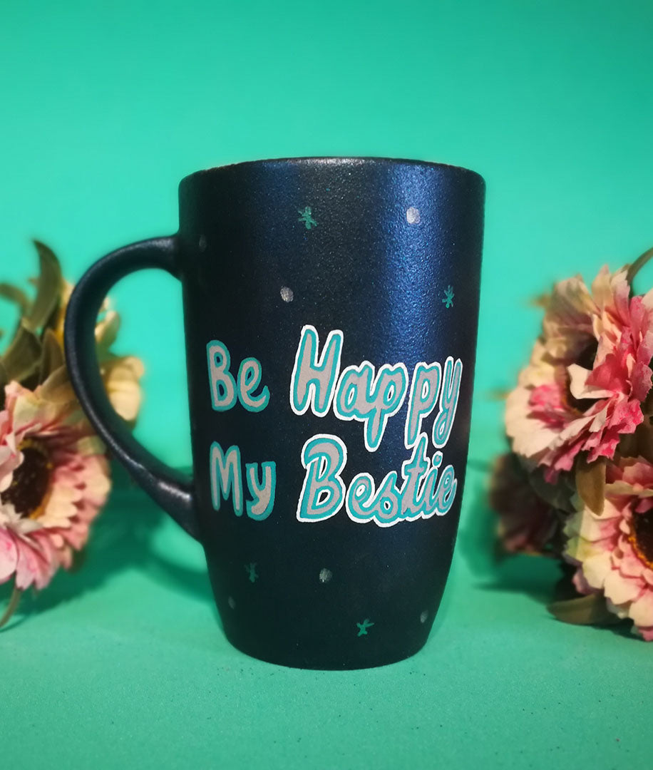 A Shimmery Blue hand painted mug with the words "BE Happy my Bestie" and the words happy and bestie in larger cursive font