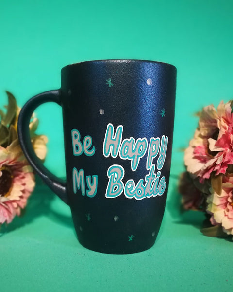 A Shimmery Blue hand painted mug with the words "BE Happy my Bestie" and the words happy and bestie in larger cursive font