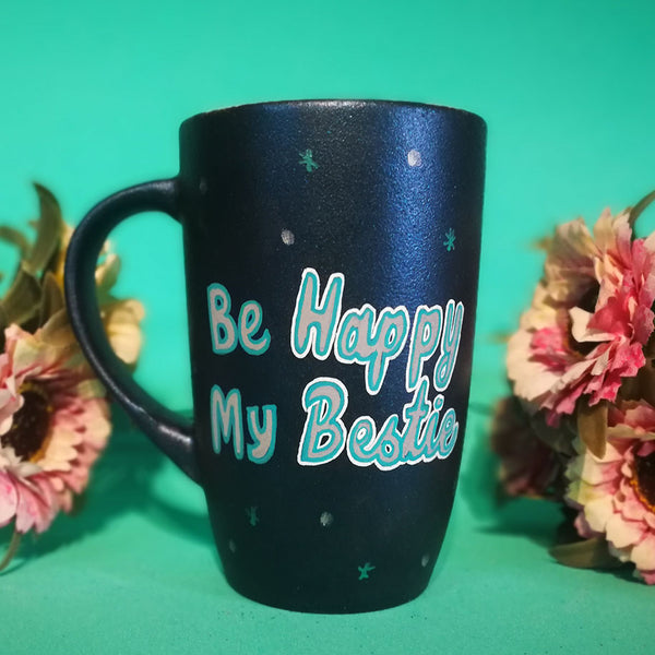 A Shimmery Blue hand painted mug with the words "BE Happy my Bestie" and the words happy and bestie in larger cursive font