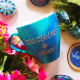 A Blue Galaxy hand painted mug with the words 