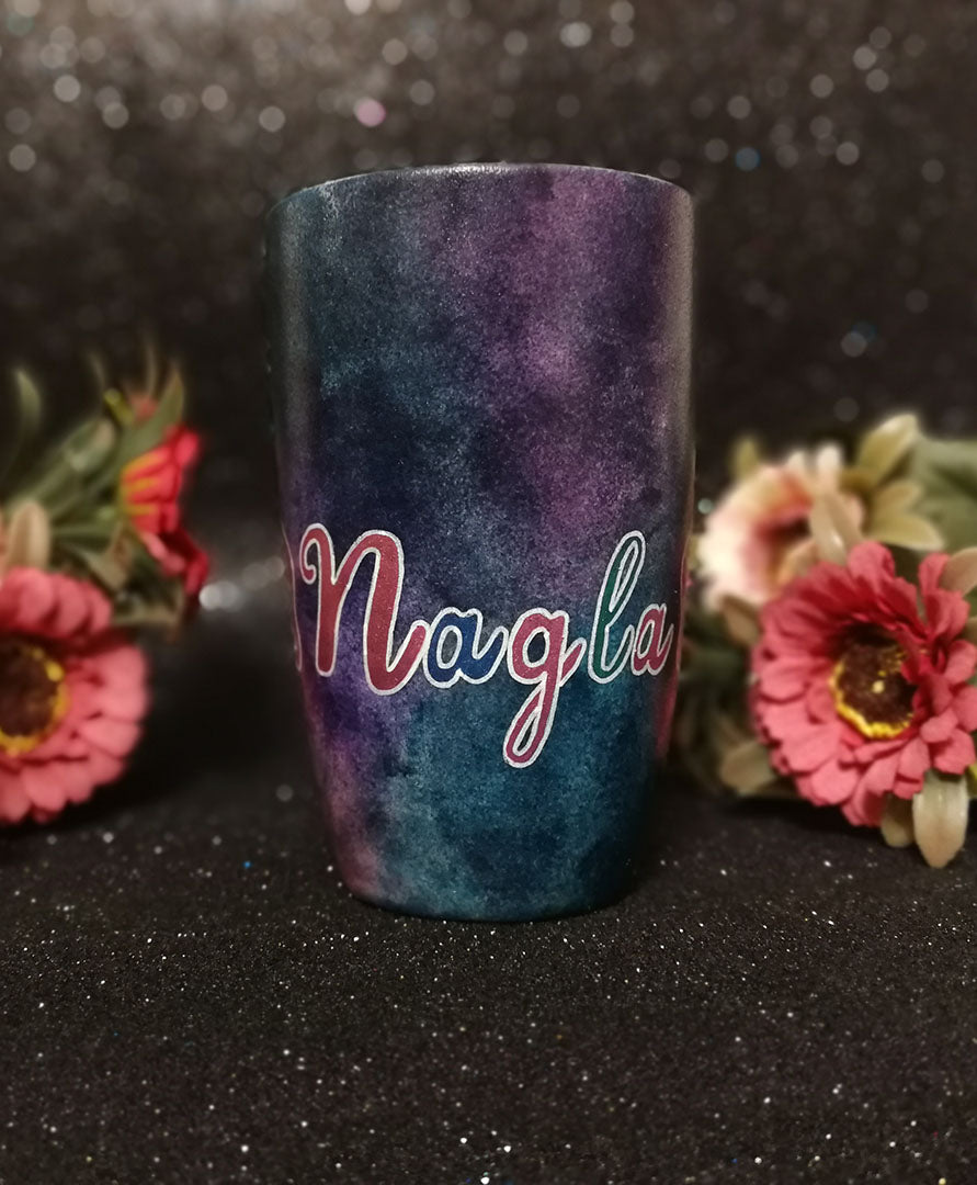 A Dark sky hand painted mug with the name "Nagla"