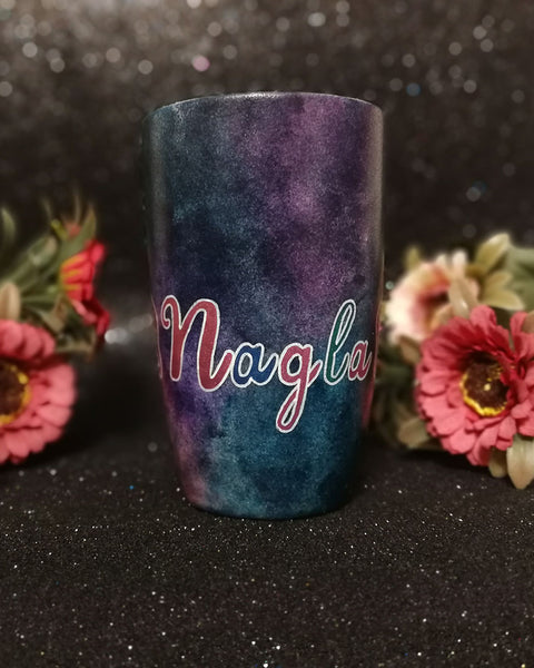 A Dark sky hand painted mug with the name "Nagla"